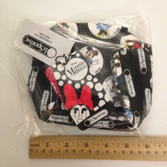 LeSportsac Handbags - NWT Disney Lesportsac  Minnie Cosmetic Pouch bag